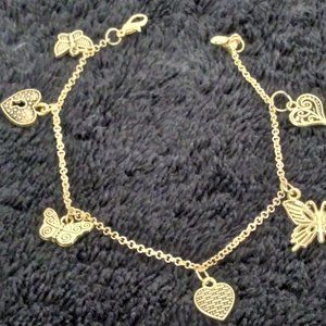 Gold tone charms hearts and butterflies' women's bracelet